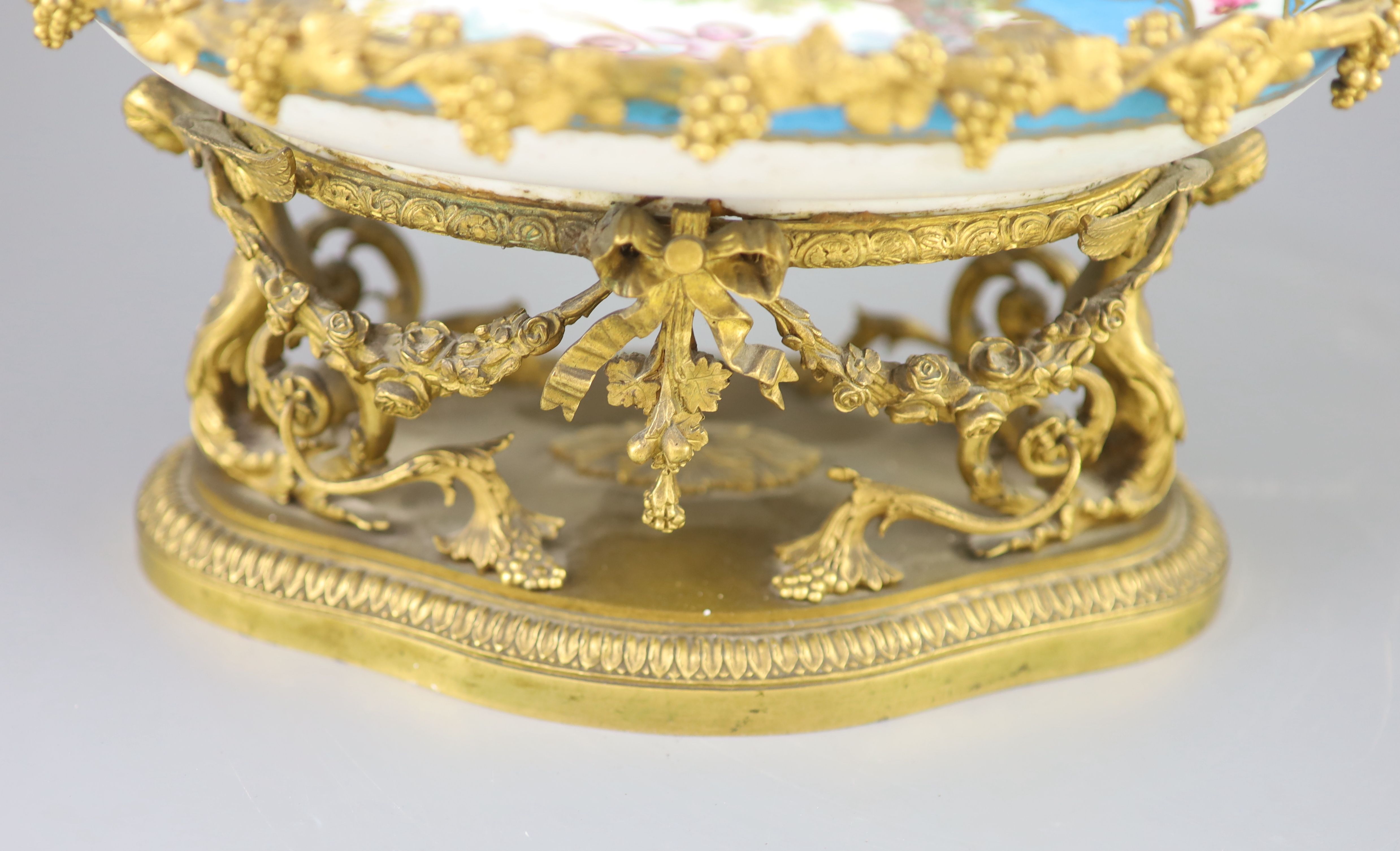 A French Sevres style porcelain and ormolu mounted oval centrepiece dish, 19th century, 28.5cm across